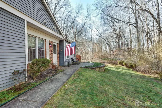 a backyard of a house with seating space