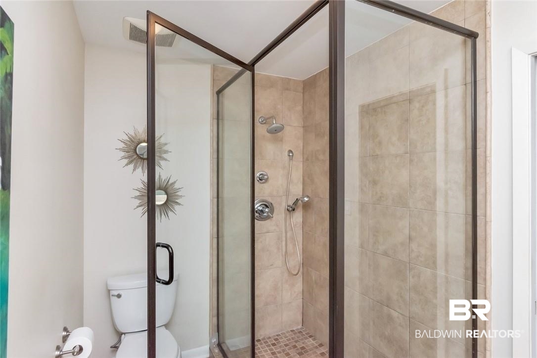 305 Fern Hill Court Mobile, AL 36608 - Photo 25 of 53 Bathroom featuring toilet and an enclosed shower