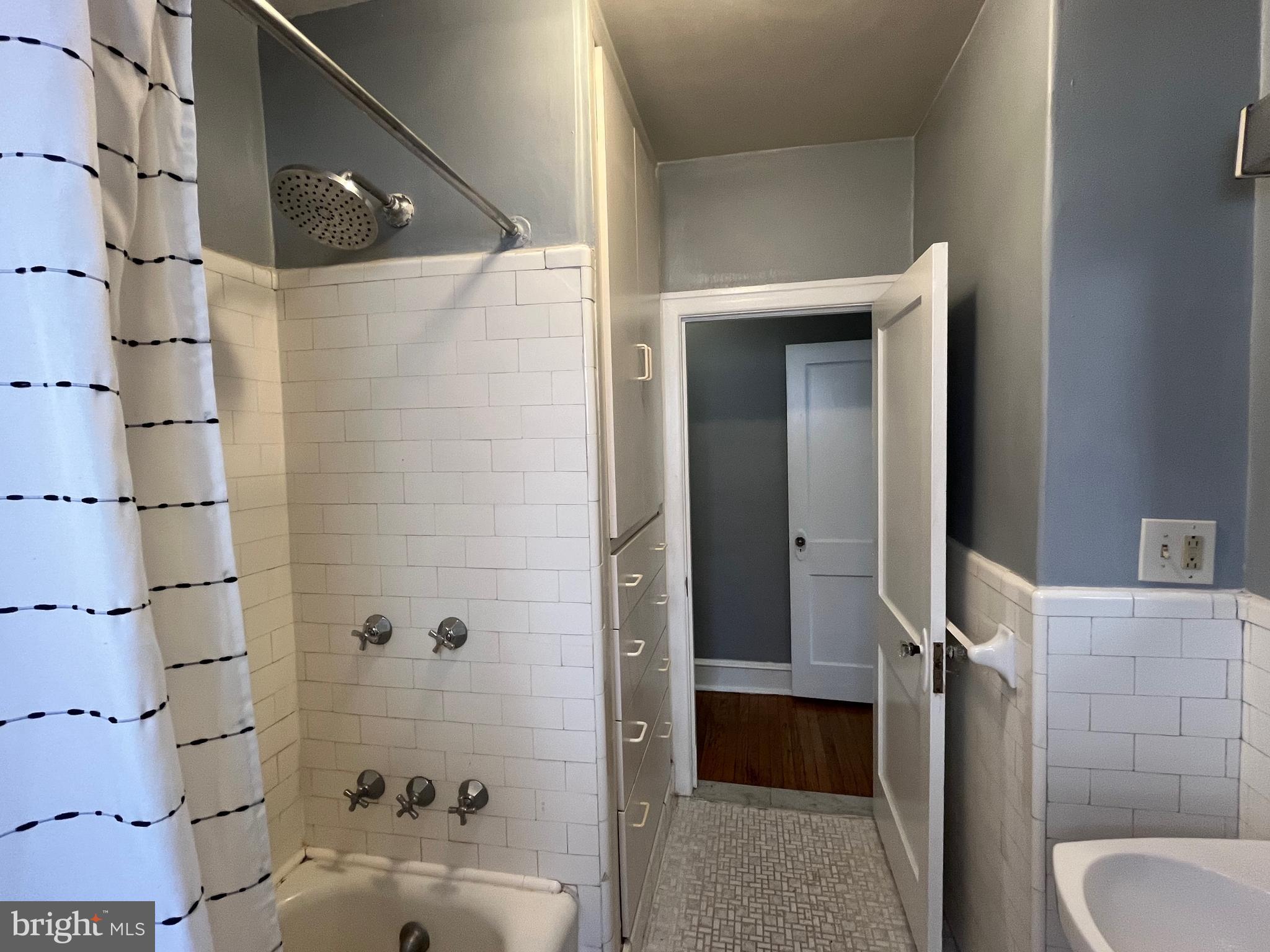 6146 Wayne Avenue, Unit 3 Philadelphia, PA 19144 - Photo 25 of 25 a bathroom with a bathtub and shower