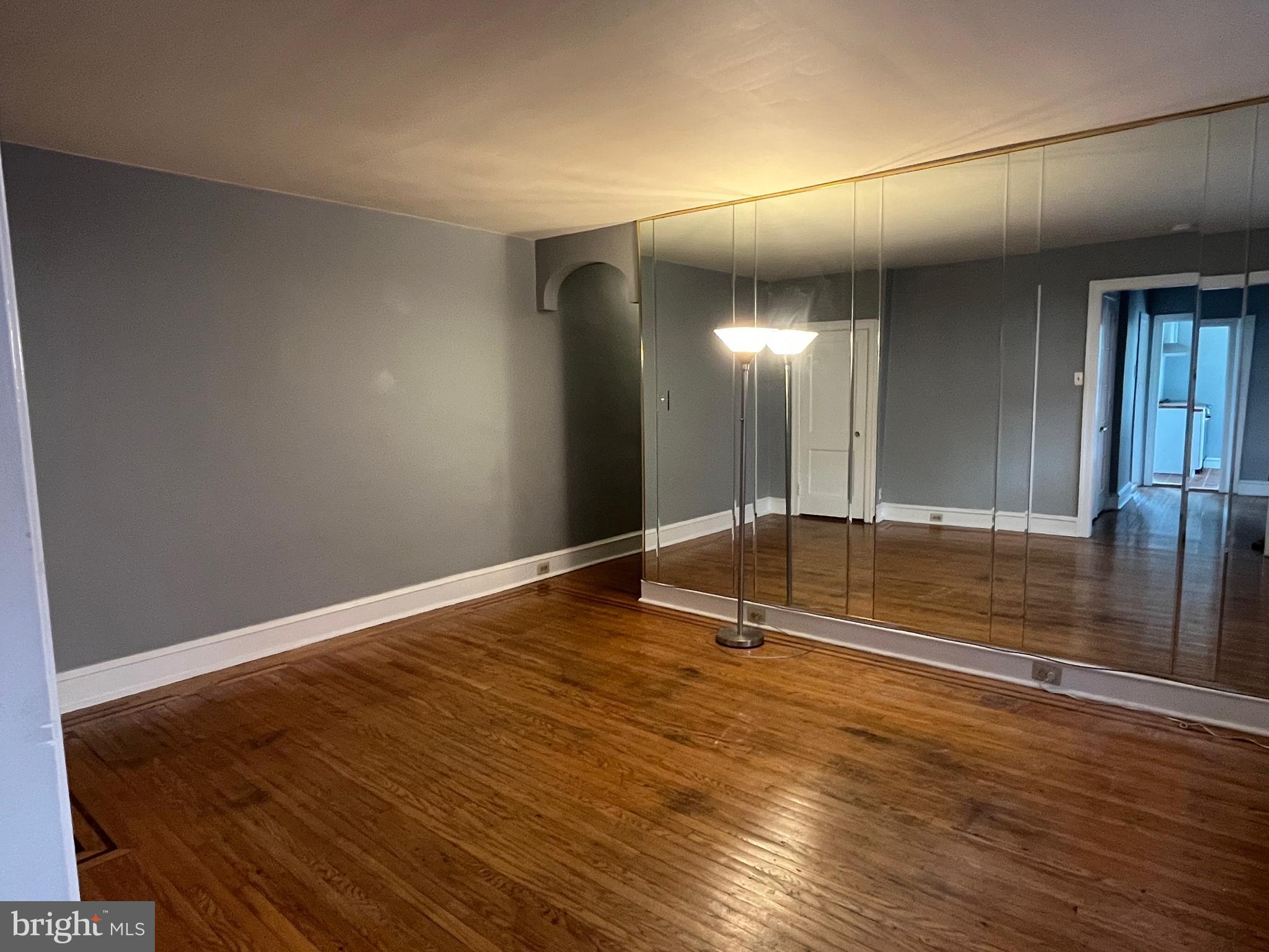 6146 Wayne Avenue, Unit 3 Philadelphia, PA 19144 - Photo 7 of 25 a view of empty room with wooden floor