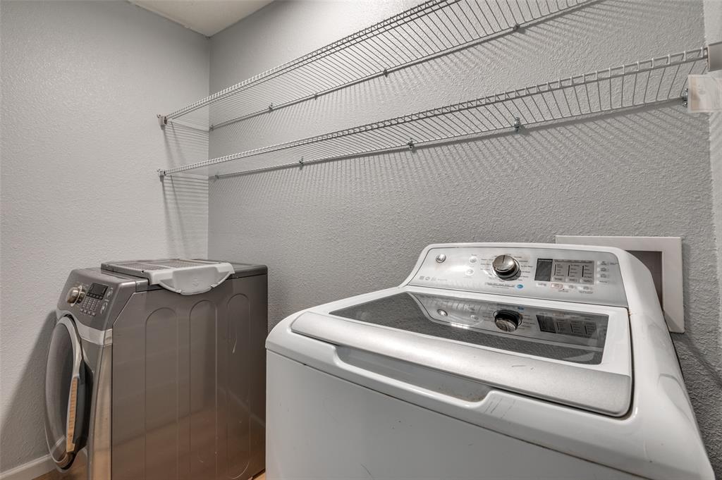 406 Freeman Street Mesquite, TX 75149 - Photo 15 of 22 a utility room with dryer and washer