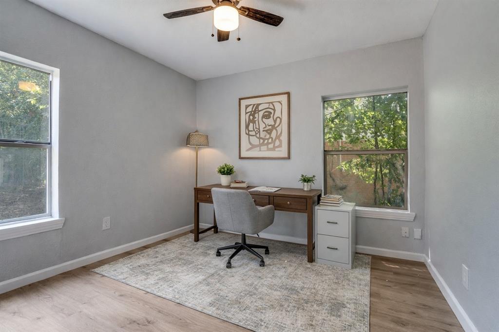 406 Freeman Street Mesquite, TX 75149 - Photo 17 of 22 a view of a workspace with furniture and a window