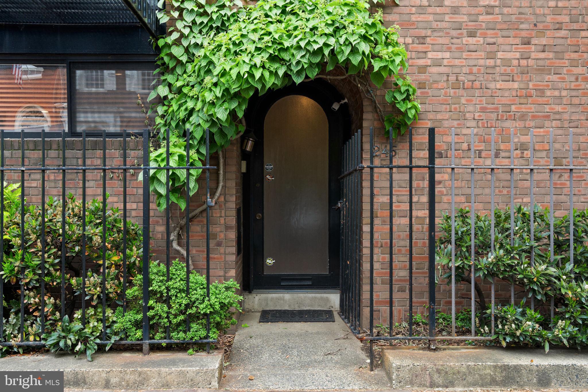 245 South 3rd Street Philadelphia, PA 19106 - Photo 2 of 63 a front view of a house with a garden