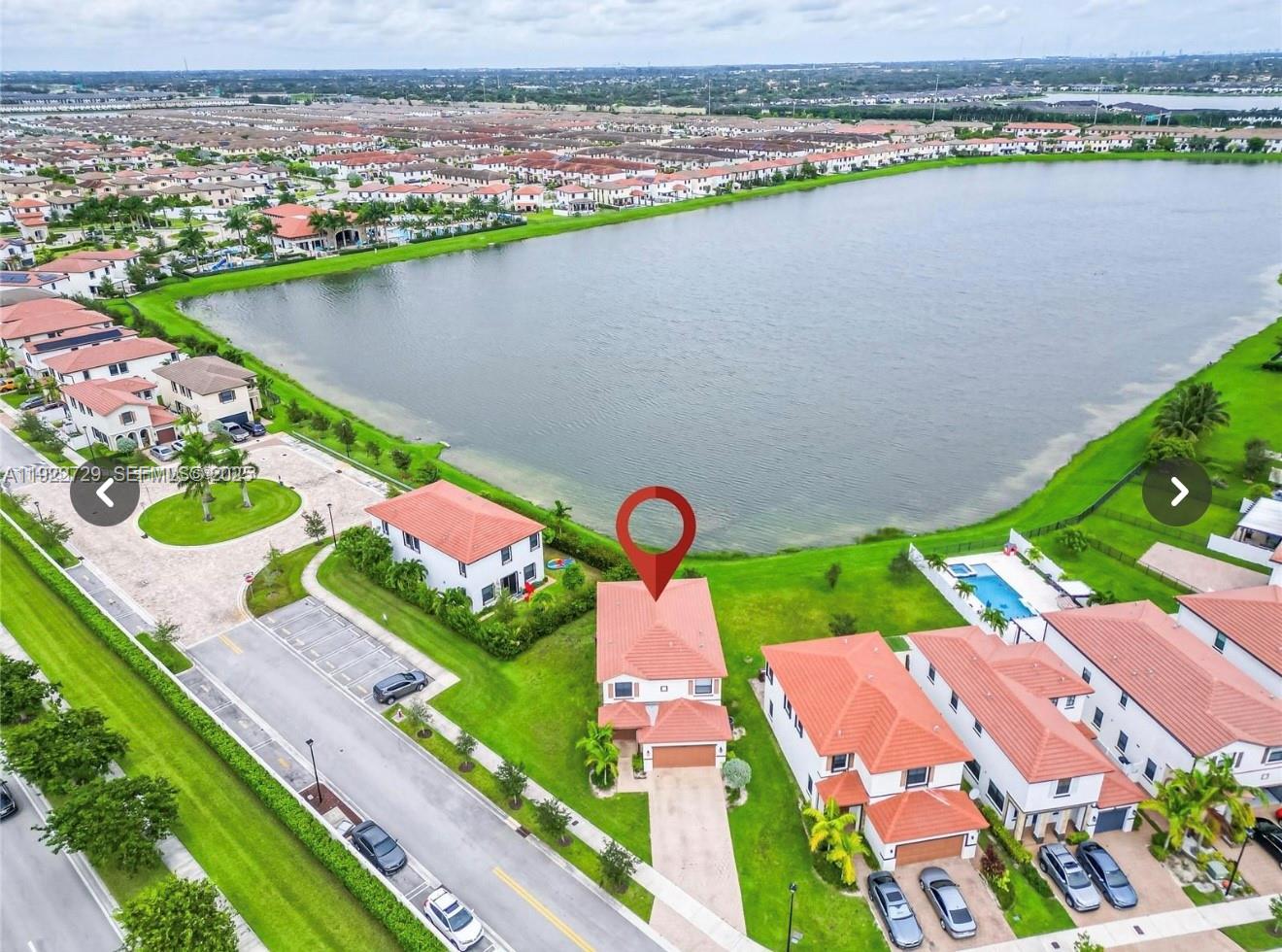 10091 West 35th Lane, Unit 10091 Hialeah, FL 33018 - Photo 1 of 32 an aerial view of a city