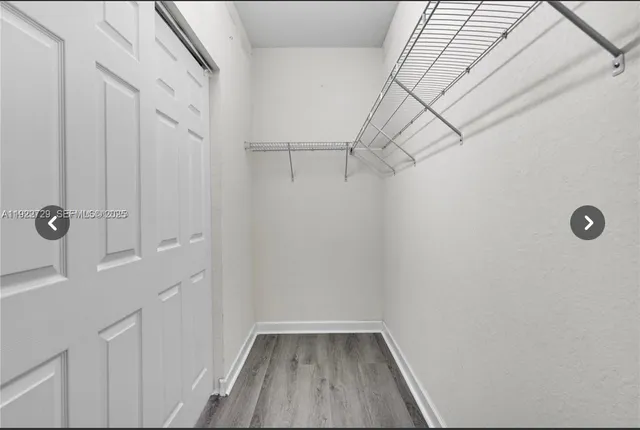 a view of a room with racks on the wall