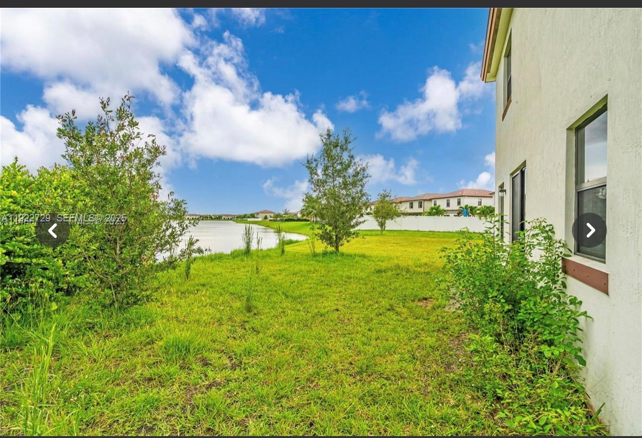 10091 West 35th Lane, Unit 10091 Hialeah, FL 33018 - Photo 30 of 32 a view of a garden