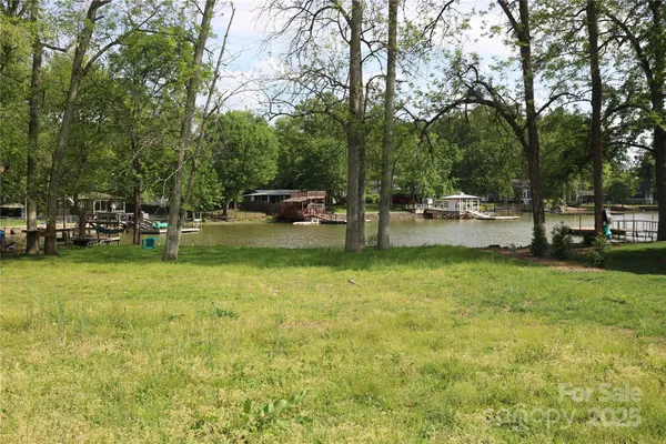 a view of a swimming pool with a bench