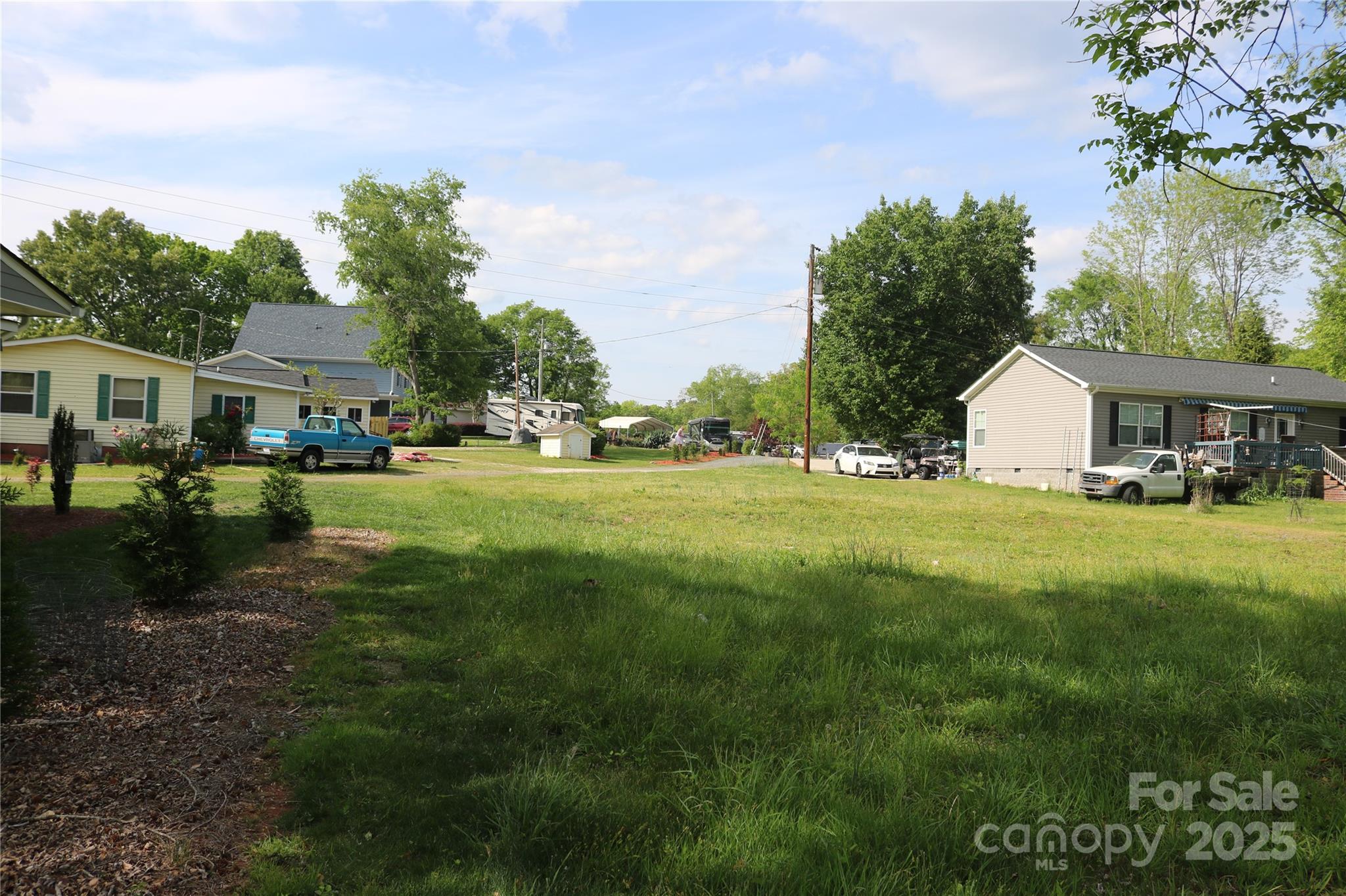 5165 Sapp Circle Clover, SC 29710 - Photo 9 of 11 a front view of a house with garden and trees