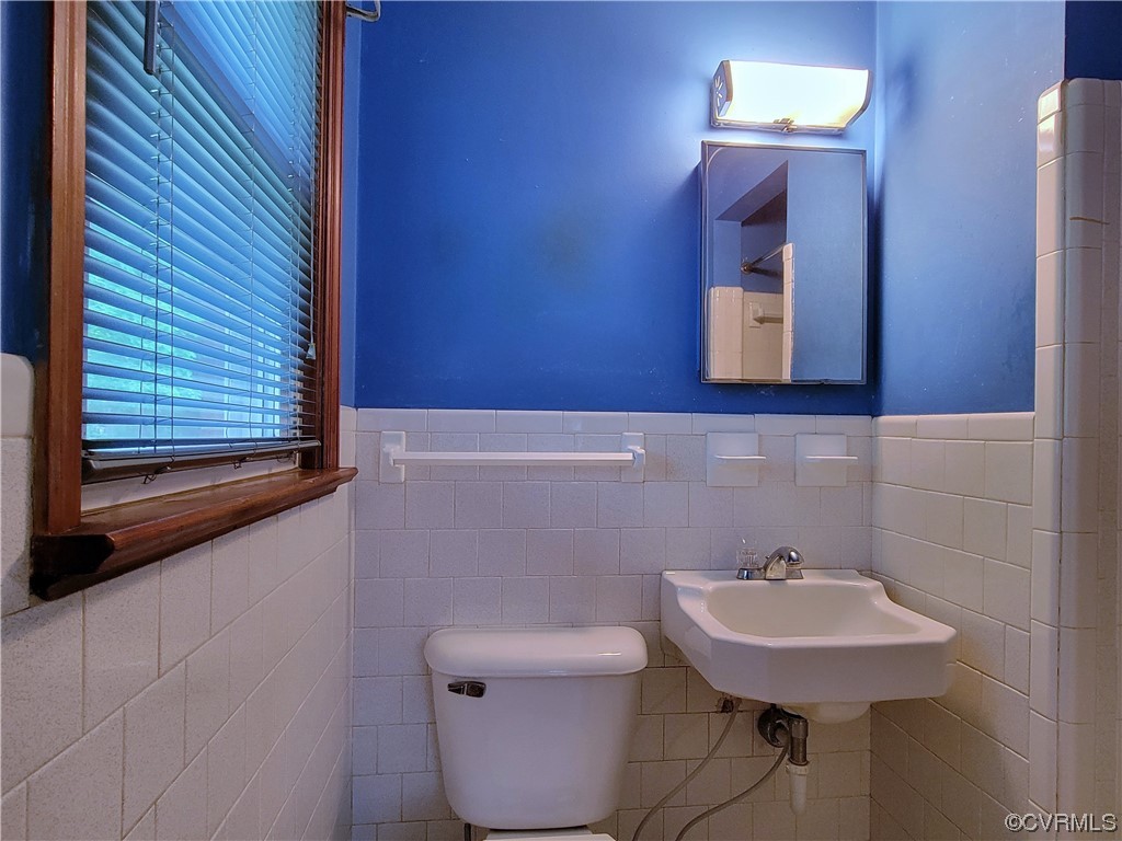 7529 Wilton Road Henrico, VA 23231 - Photo 19 of 31 a bathroom with a sink and a mirror