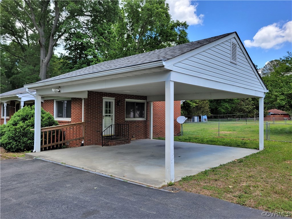 7529 Wilton Road Henrico, VA 23231 - Photo 23 of 31 a view of a house with backyard and porch