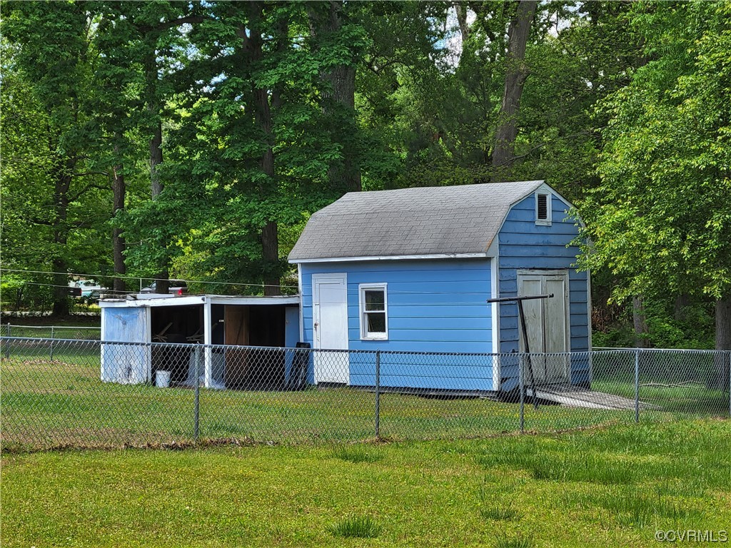 7529 Wilton Road Henrico, VA 23231 - Photo 29 of 31 a house with green field in front of it