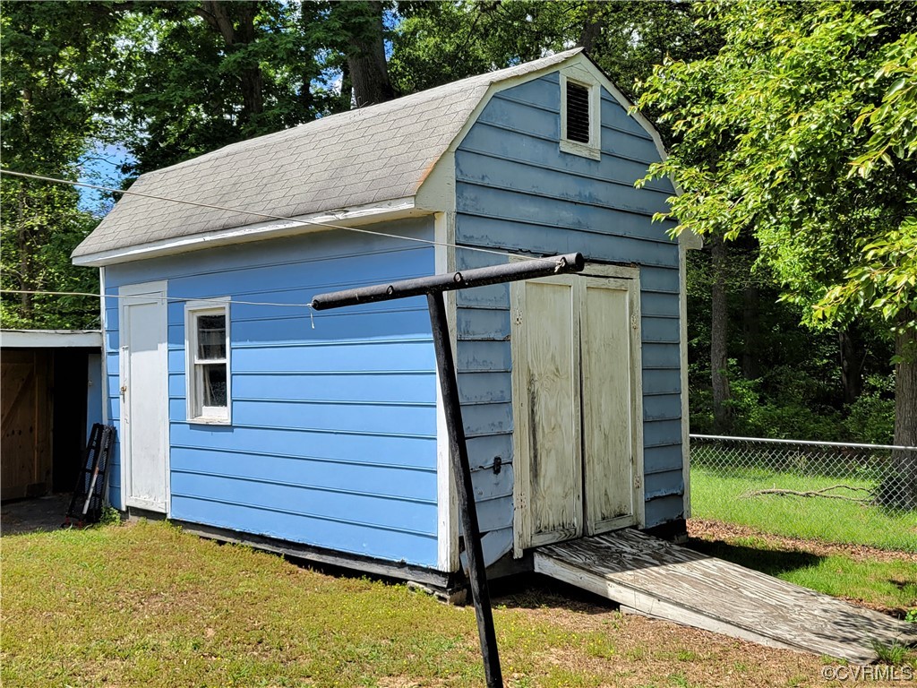 7529 Wilton Road Henrico, VA 23231 - Photo 30 of 31 a view of a house with a backyard