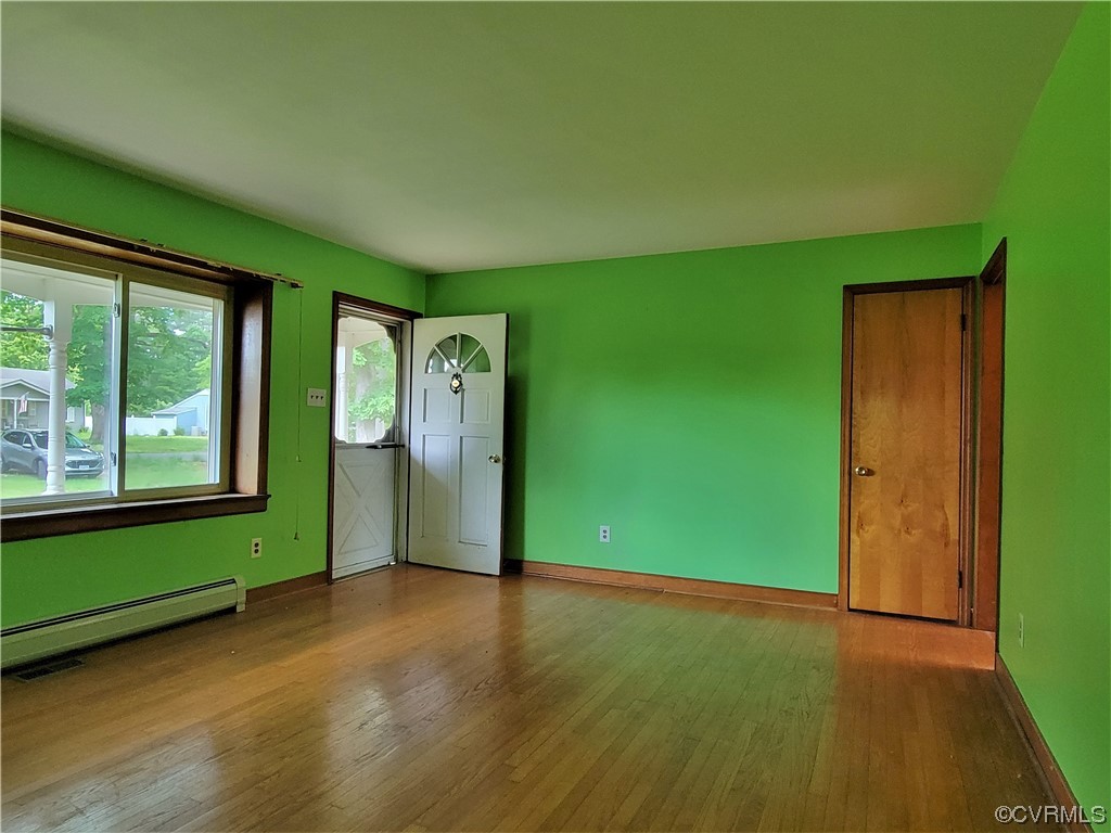 7529 Wilton Road Henrico, VA 23231 - Photo 3 of 31 a view of a room with window wooden floor and windows