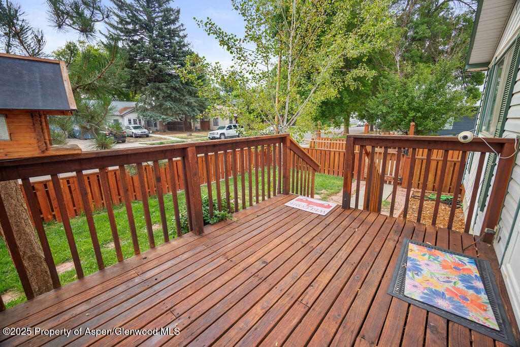 562 Rose Street Craig, CO 81625 - Photo 11 of 59 a view of balcony with wooden floor and fence