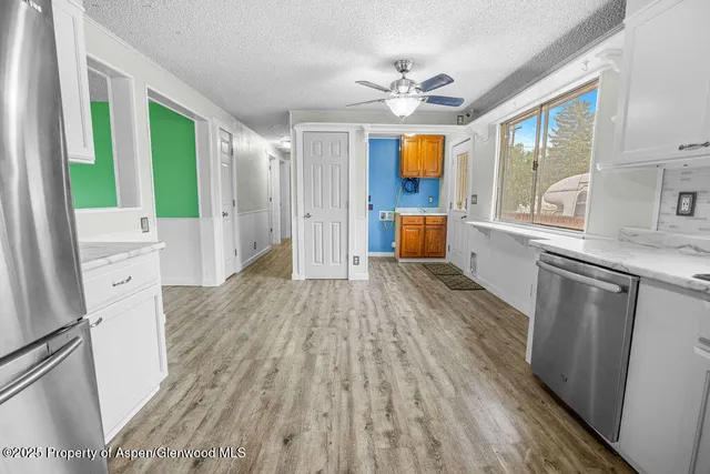 a view of a big room with wooden floor