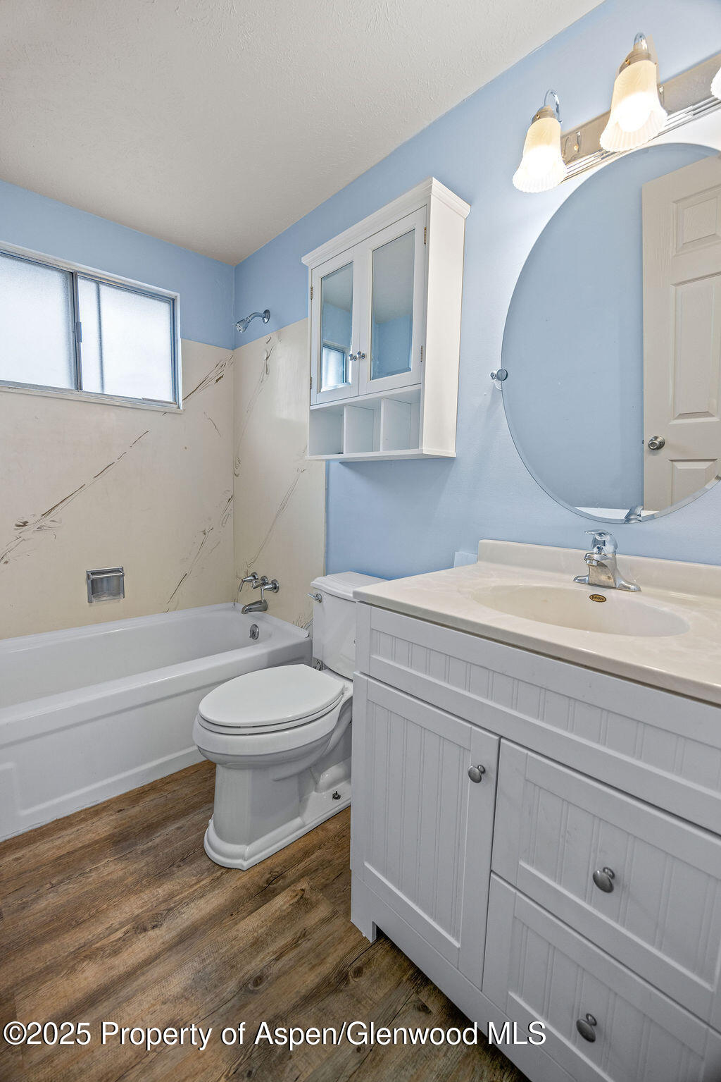 562 Rose Street Craig, CO 81625 - Photo 31 of 59 a bathroom with a toilet a sink and mirror