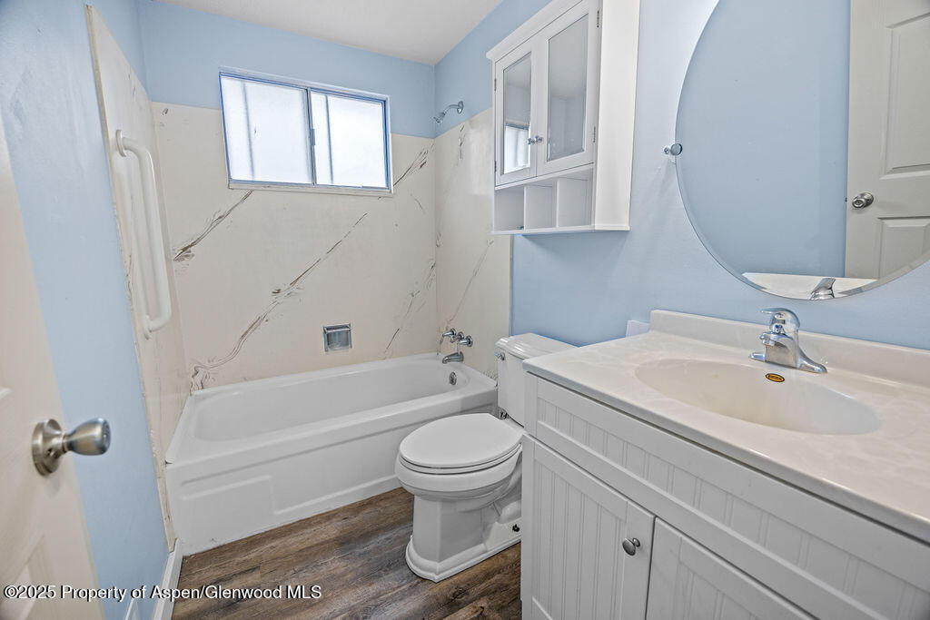 562 Rose Street Craig, CO 81625 - Photo 32 of 59 a bathroom with a sink a toilet and a bathtub