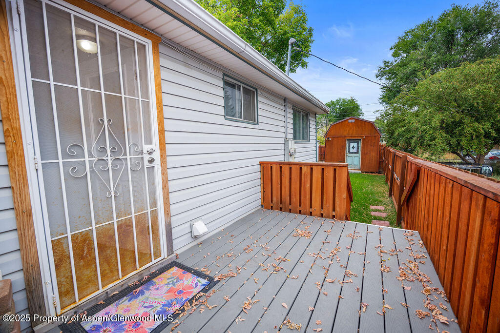 562 Rose Street Craig, CO 81625 - Photo 35 of 59 a view of a wooden deck with a sink