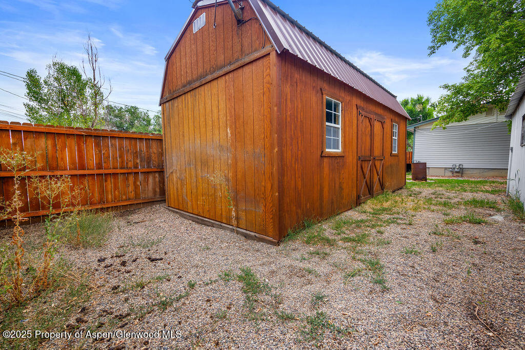 562 Rose Street Craig, CO 81625 - Photo 40 of 59 a backyard of a house
