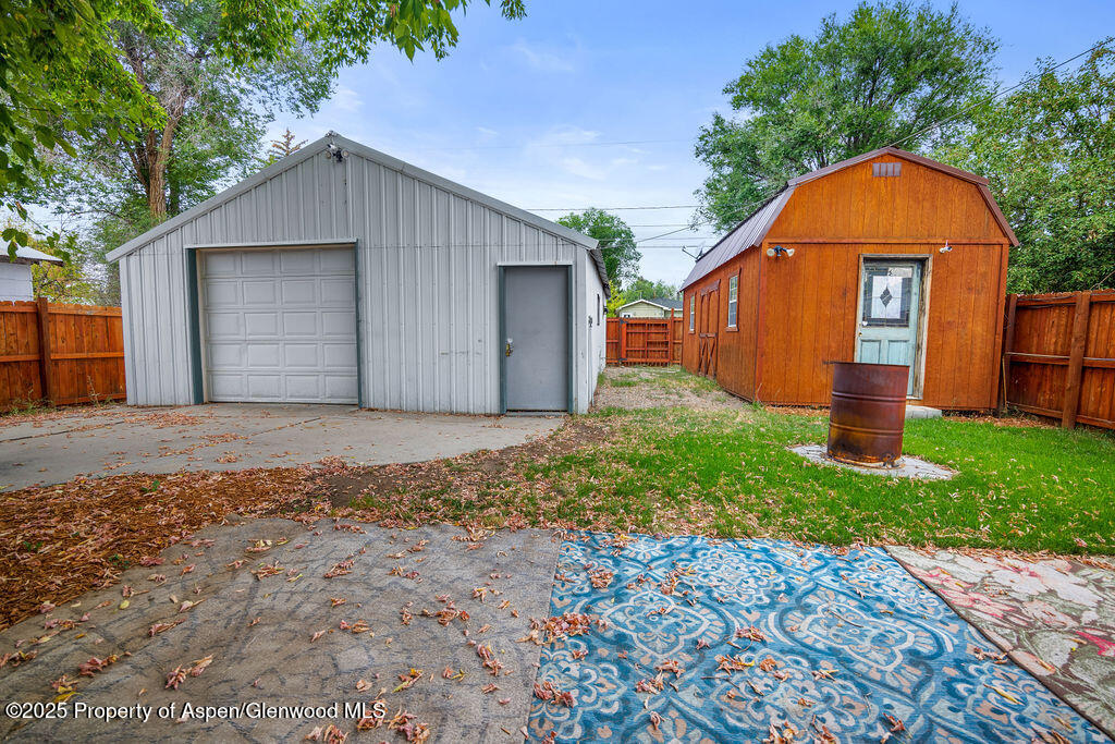 562 Rose Street Craig, CO 81625 - Photo 42 of 59 a view of a backyard of the house