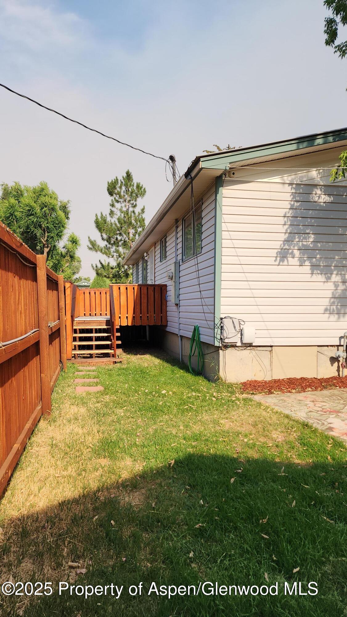 562 Rose Street Craig, CO 81625 - Photo 52 of 59 a view of a backyard with a garden