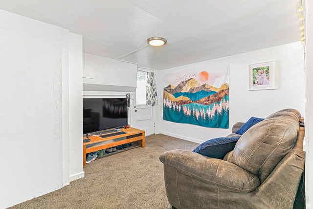 232 300 North Provo, UT 84606 - Photo 14 of 27 Living room with carpet and baseboards