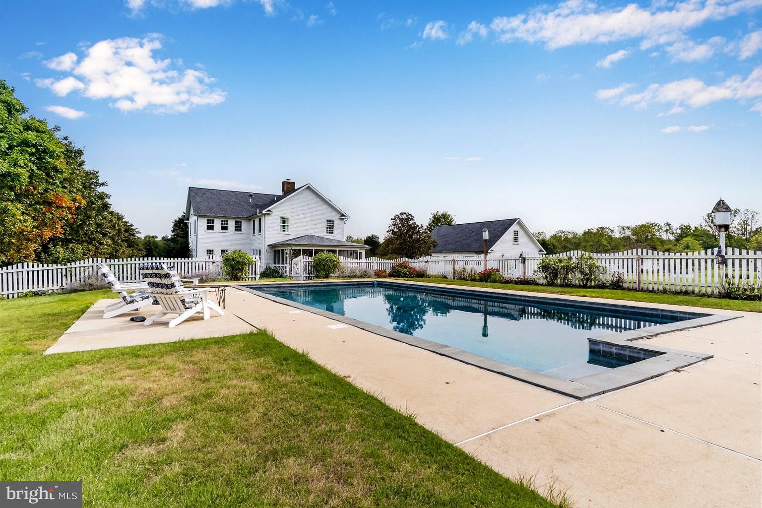111 Old Stonehouse Road North Carlisle, PA 17015 - Photo 48 of 64 Pool and white picket fence