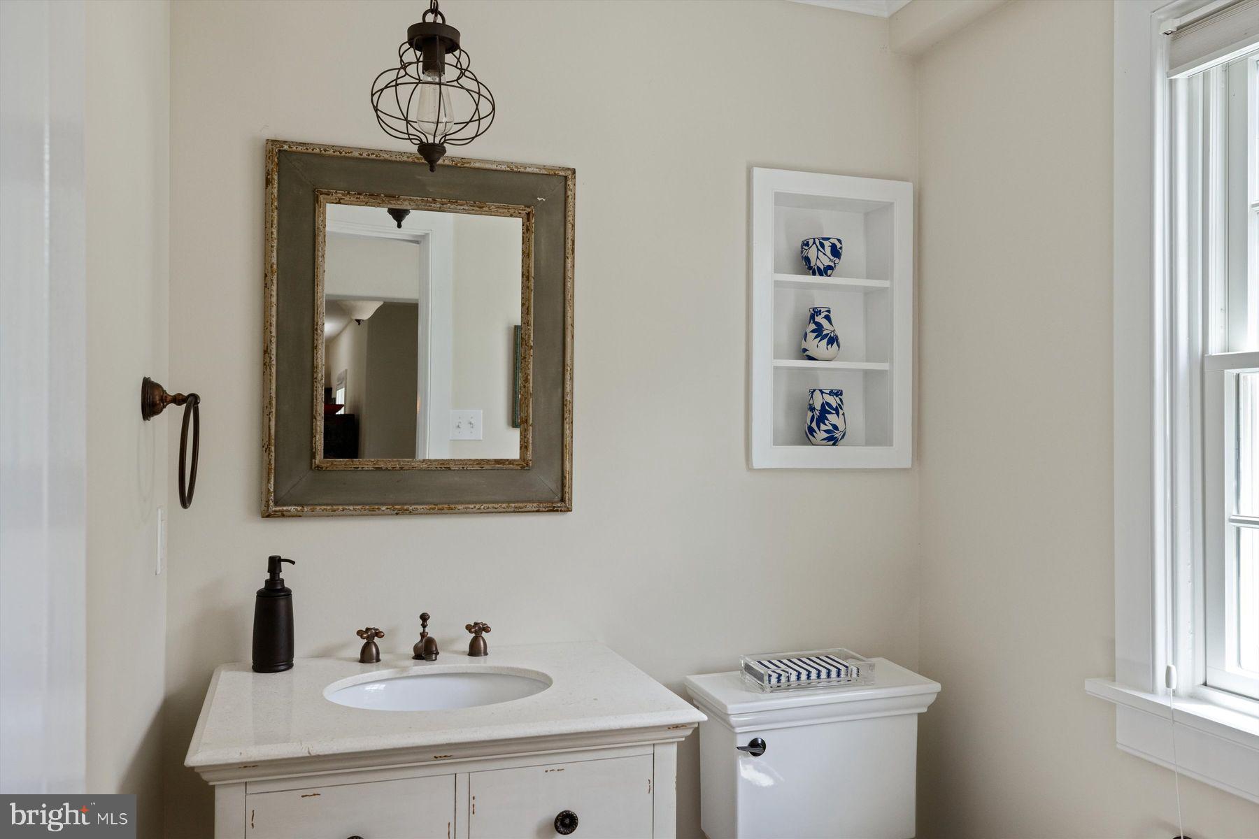 3087 Creamery Road New Hope, PA 18938 - Photo 27 of 68 a bathroom with a sink a mirror and vanity