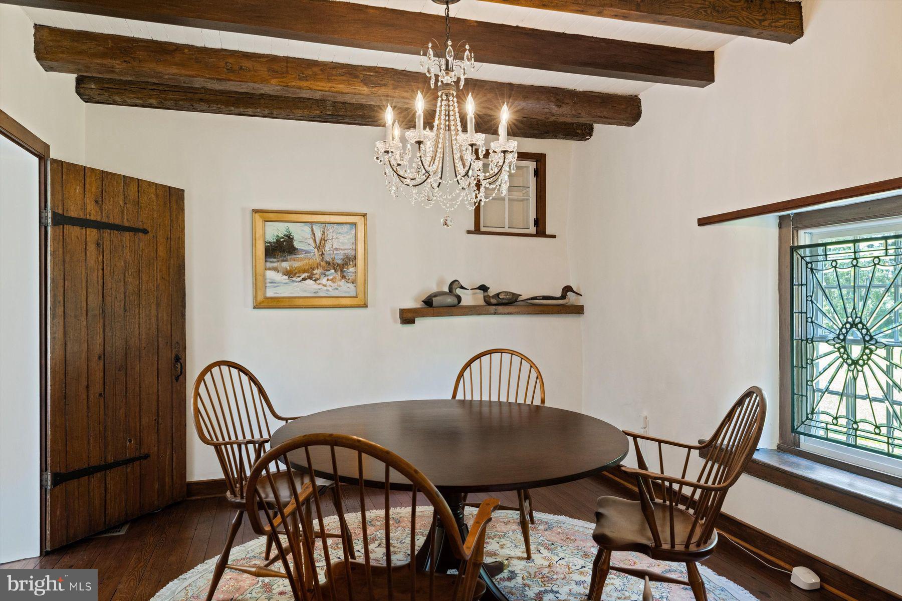 3087 Creamery Road New Hope, PA 18938 - Photo 29 of 68 a view of a dining room with furniture and chandelier