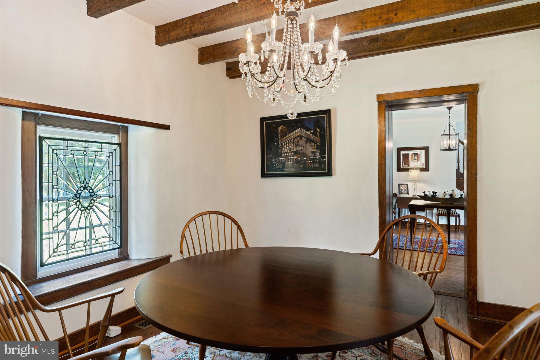 3087 Creamery Road New Hope, PA 18938 - Photo 30 of 68 a view of a dining room with furniture window and wooden floor