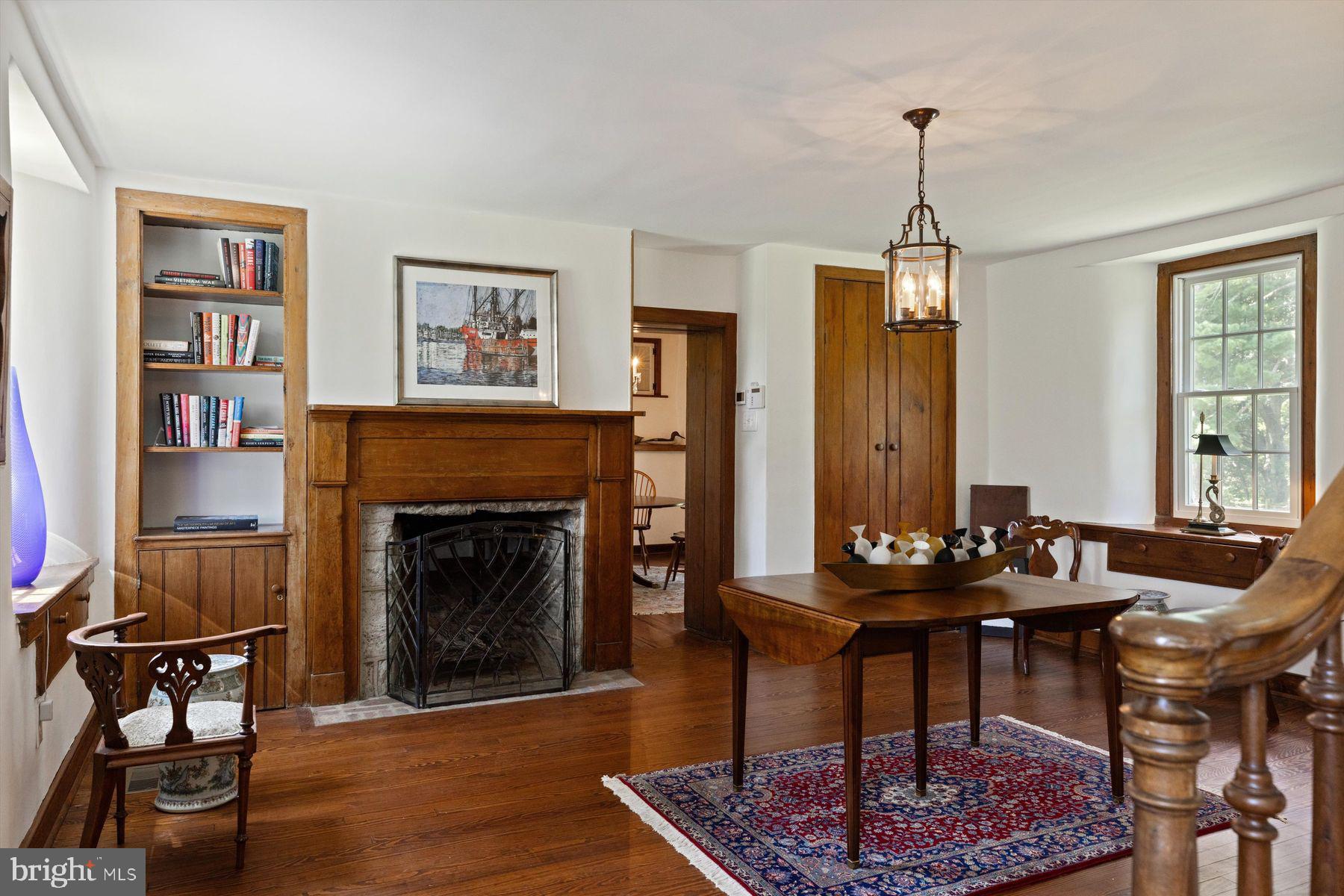 3087 Creamery Road New Hope, PA 18938 - Photo 31 of 68 a living room with furniture and a fireplace