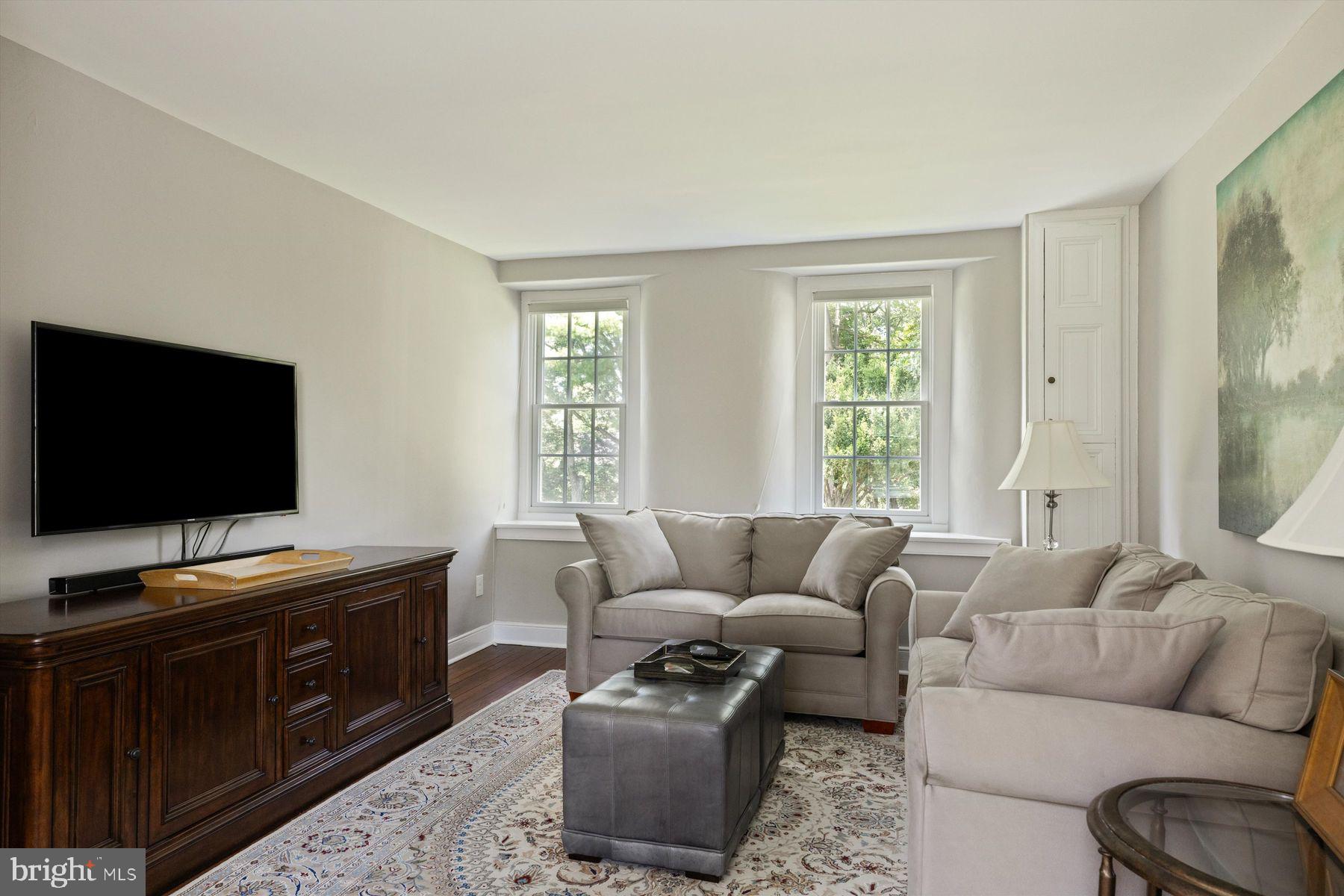 3087 Creamery Road New Hope, PA 18938 - Photo 36 of 68 a living room with furniture and a flat screen tv