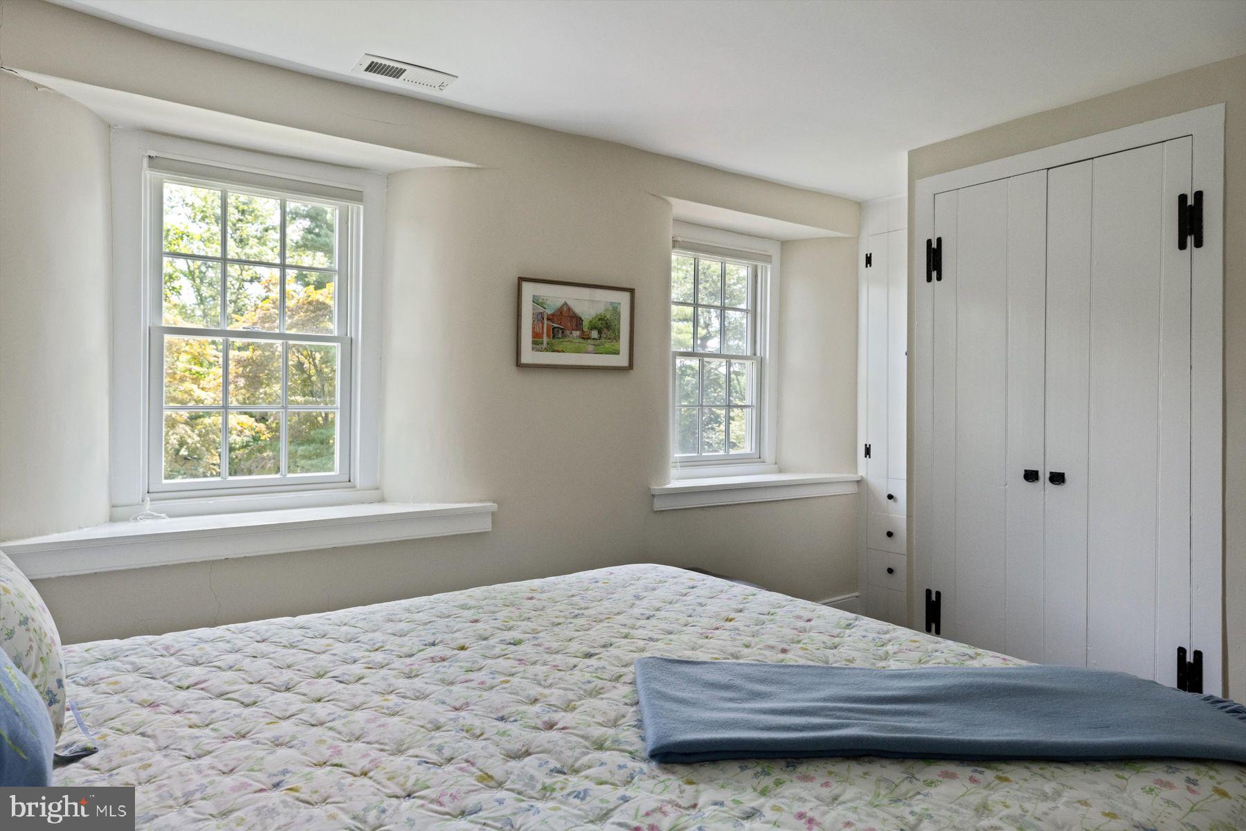 3087 Creamery Road New Hope, PA 18938 - Photo 40 of 68 a bedroom with a bed and a window