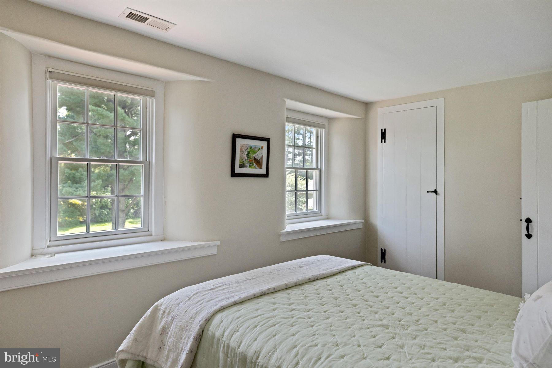 3087 Creamery Road New Hope, PA 18938 - Photo 46 of 68 a bedroom with a bed and a window