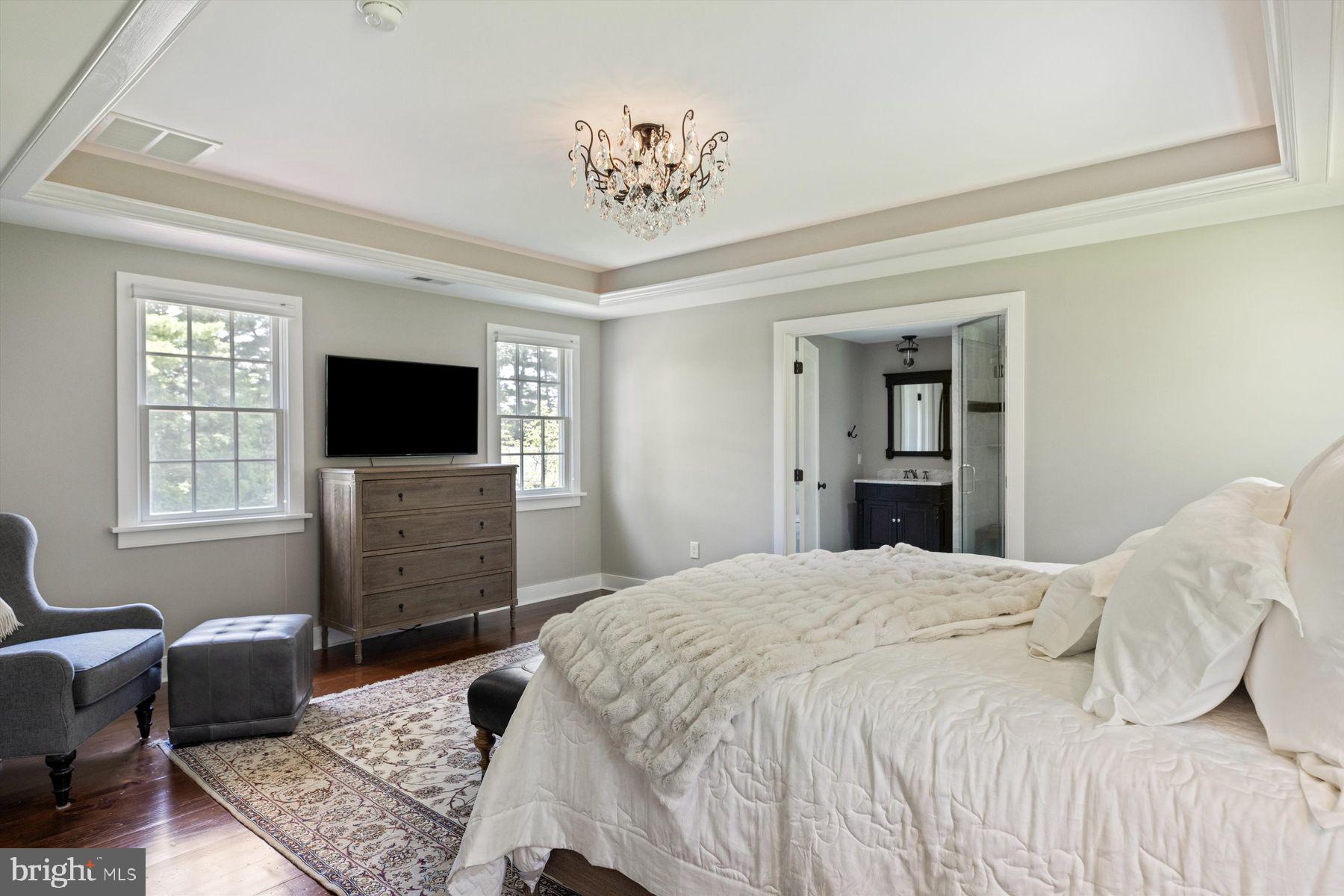 3087 Creamery Road New Hope, PA 18938 - Photo 54 of 68 a bedroom with a bed and a flat screen tv