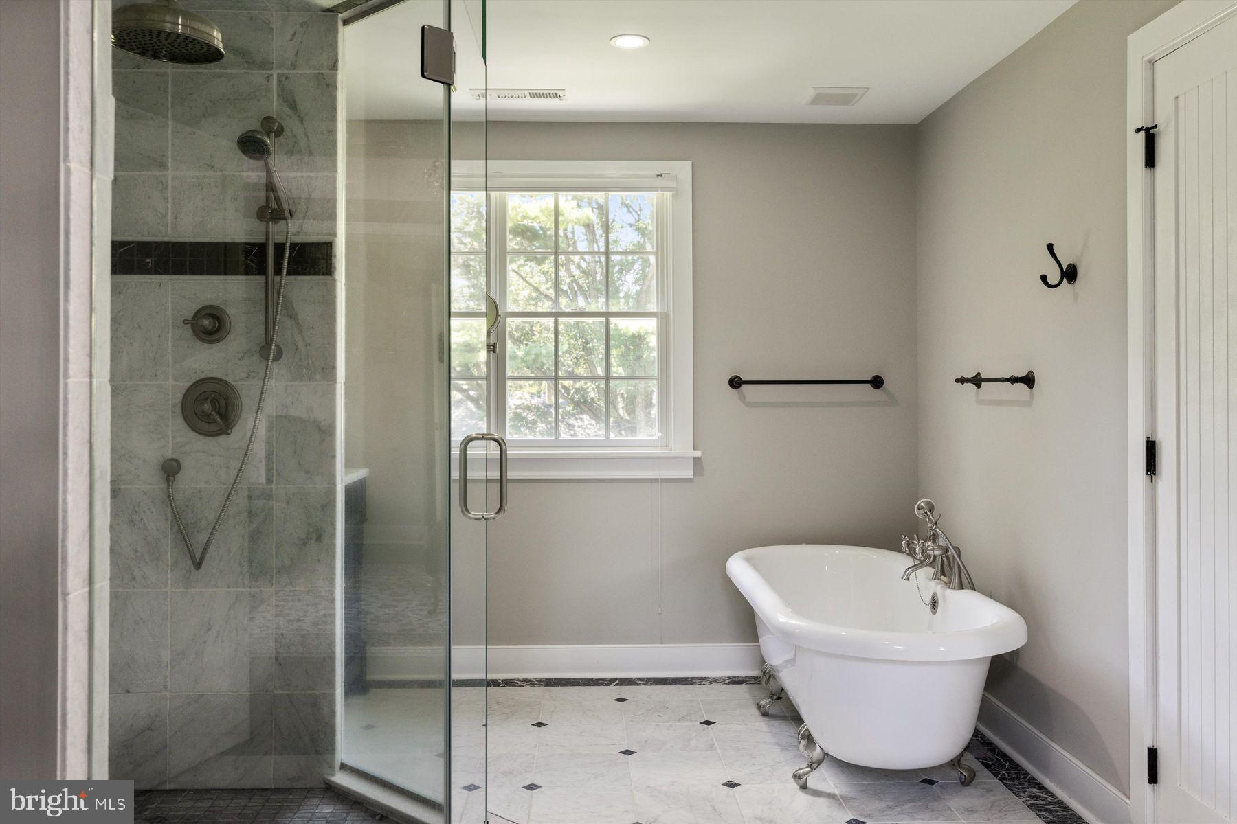 3087 Creamery Road New Hope, PA 18938 - Photo 57 of 68 a bathroom with a bathtub and shower