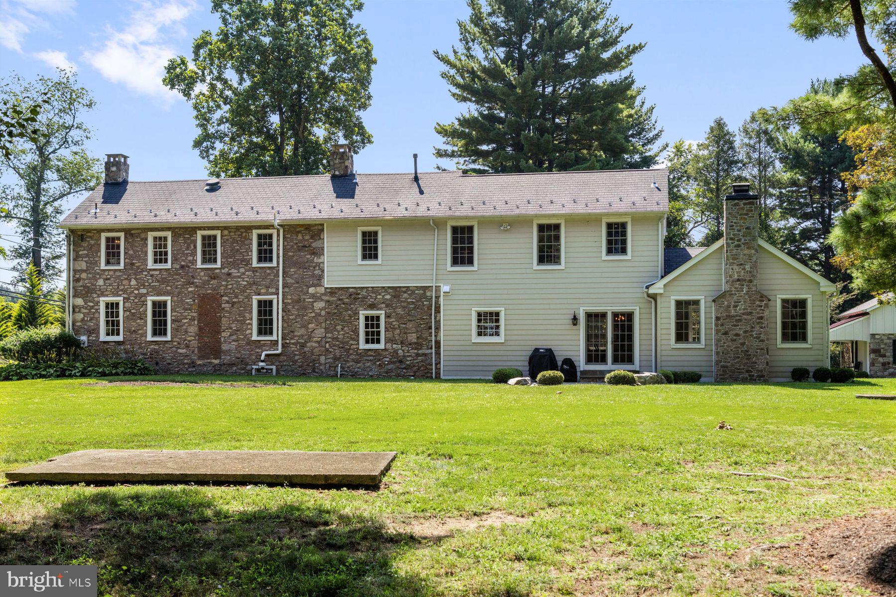3087 Creamery Road New Hope, PA 18938 - Photo 8 of 68 a view of a house with a yard and large trees