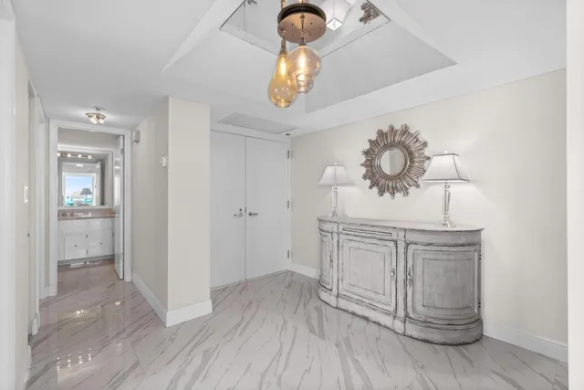 a bathroom with a sink a mirror and vanity