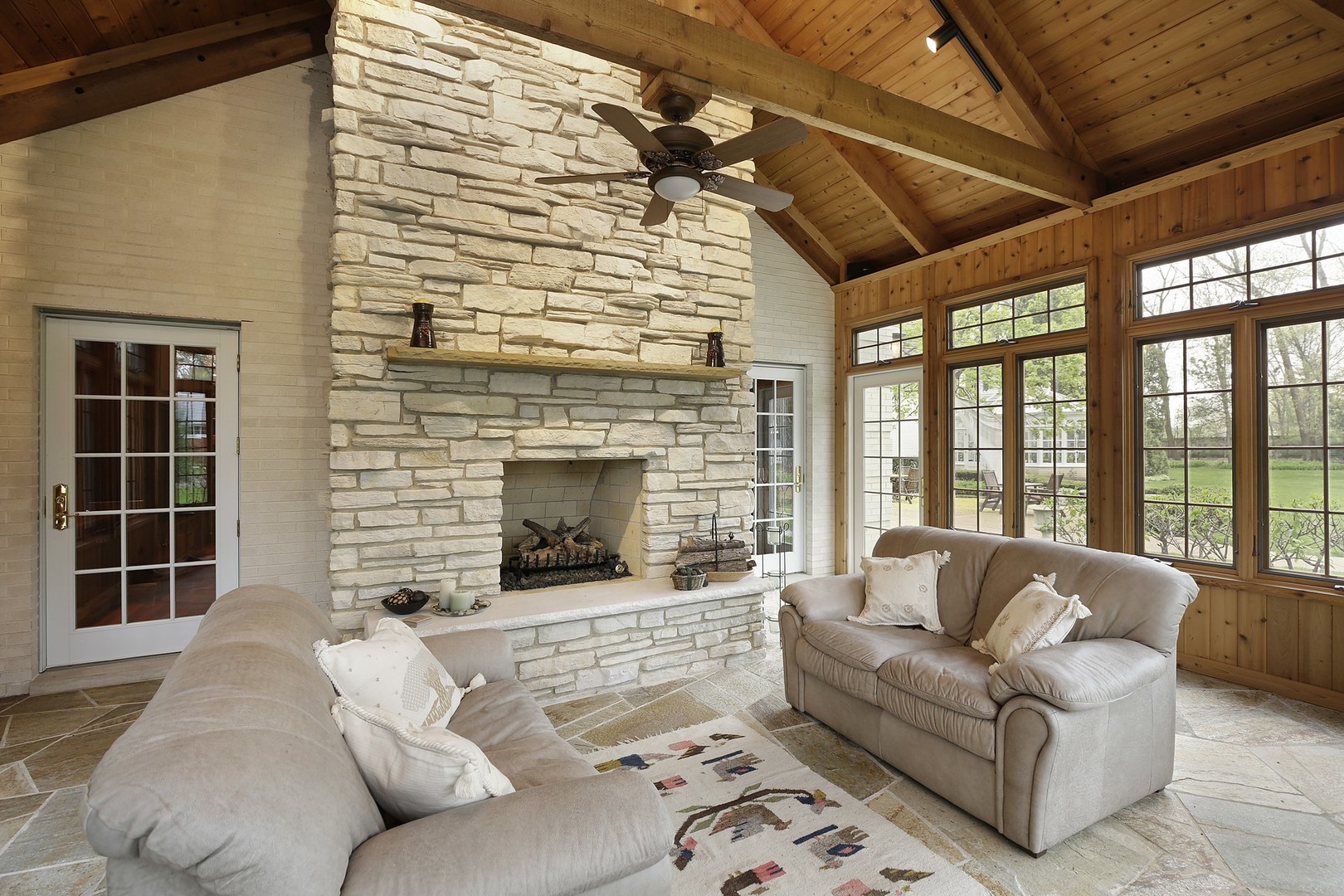 578 Sunset Ridge Road Northfield, IL 60093 - Photo 11 of 21 a living room with furniture and a fireplace