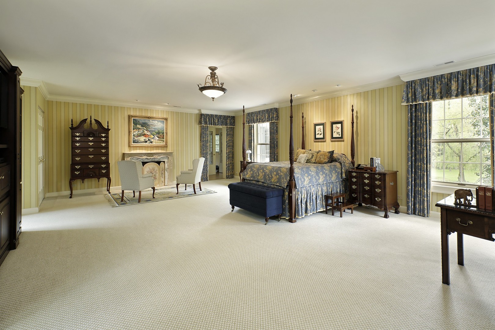 578 Sunset Ridge Road Northfield, IL 60093 - Photo 15 of 21 a spacious bedroom with furniture and a large window