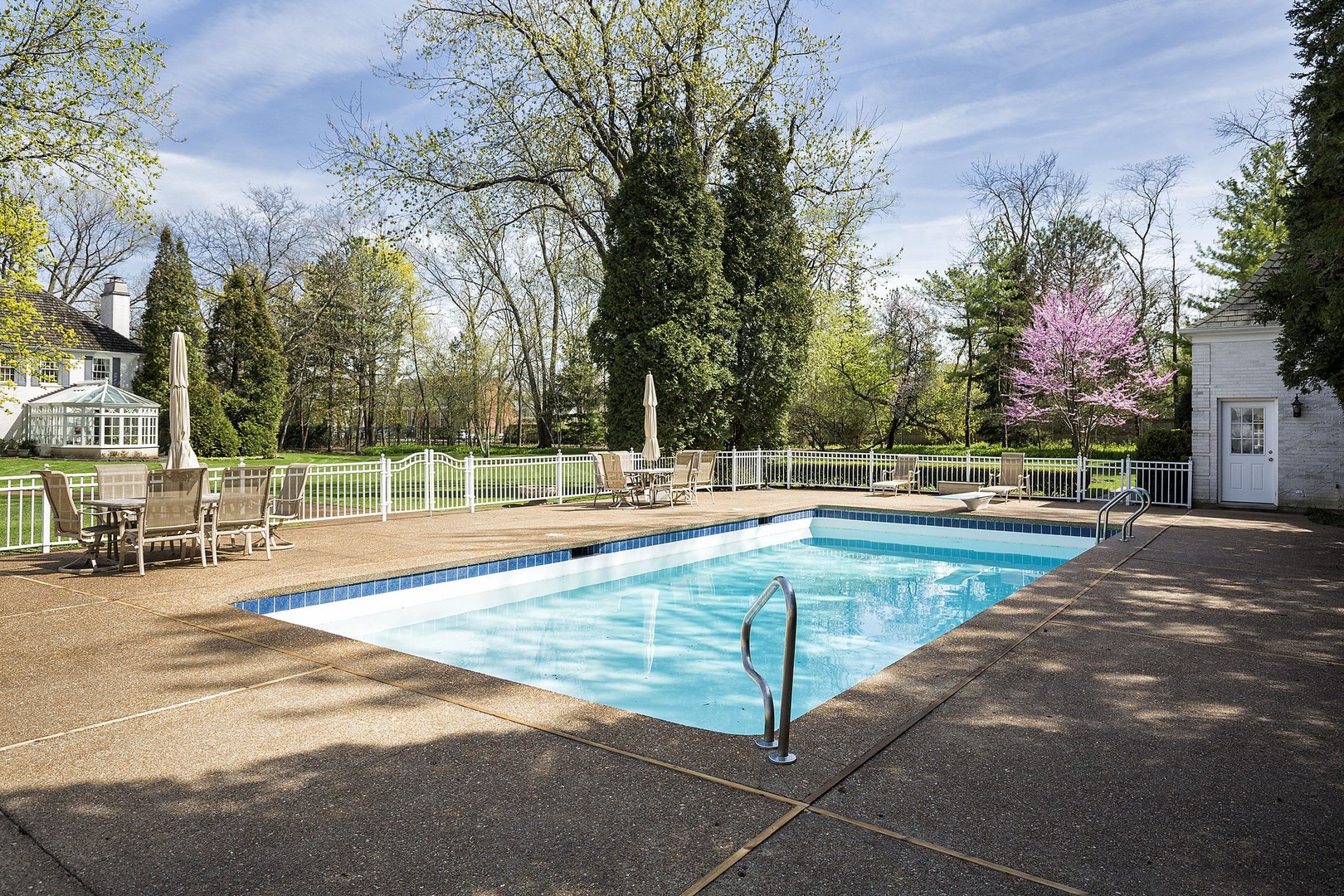 578 Sunset Ridge Road Northfield, IL 60093 - Photo 18 of 21 a view of a swimming pool with an outdoor space