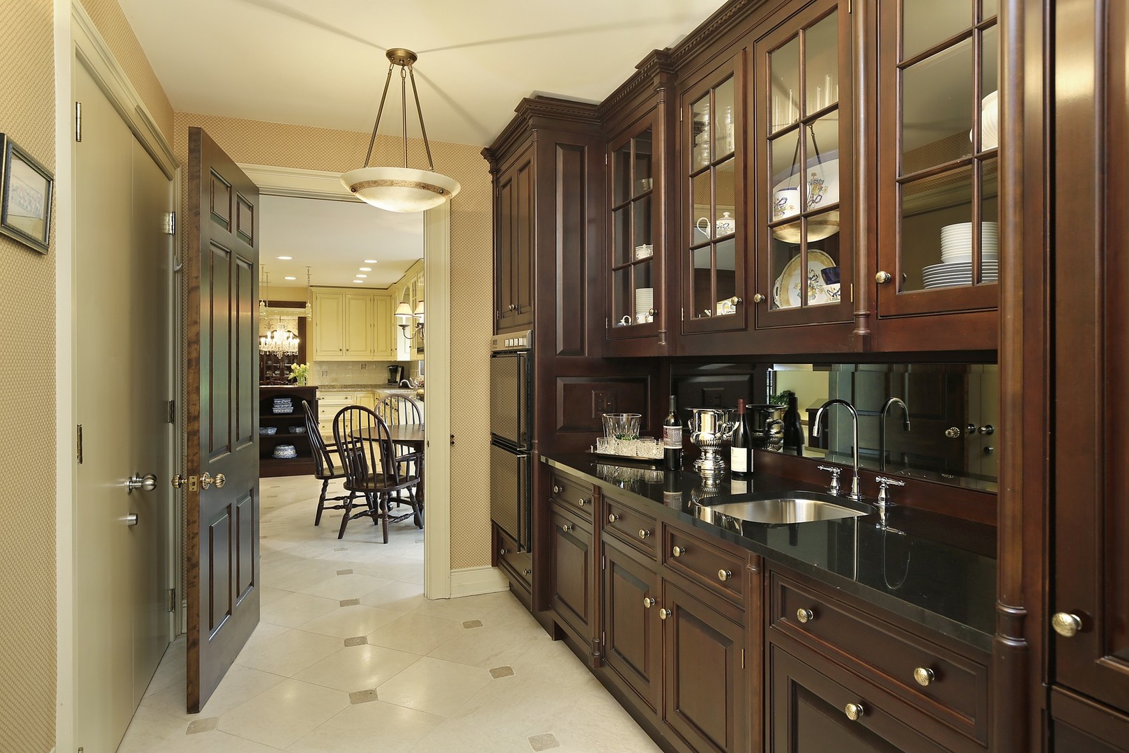 578 Sunset Ridge Road Northfield, IL 60093 - Photo 7 of 21 a kitchen with a refrigerator and a sink
