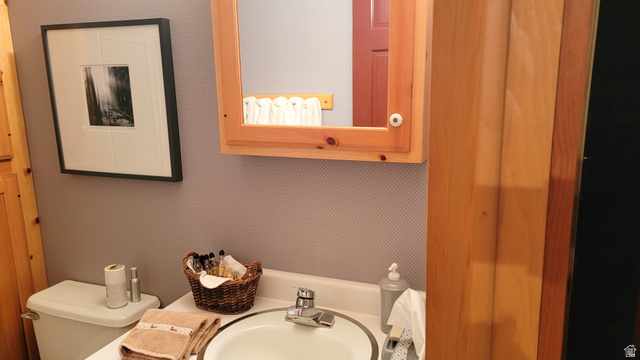 6210 Mountain View Road, Unit 133 Coalville, UT 84017 - Photo 64 of 87 There is a pine vanity and matching custom mirrored medicine cabinet.