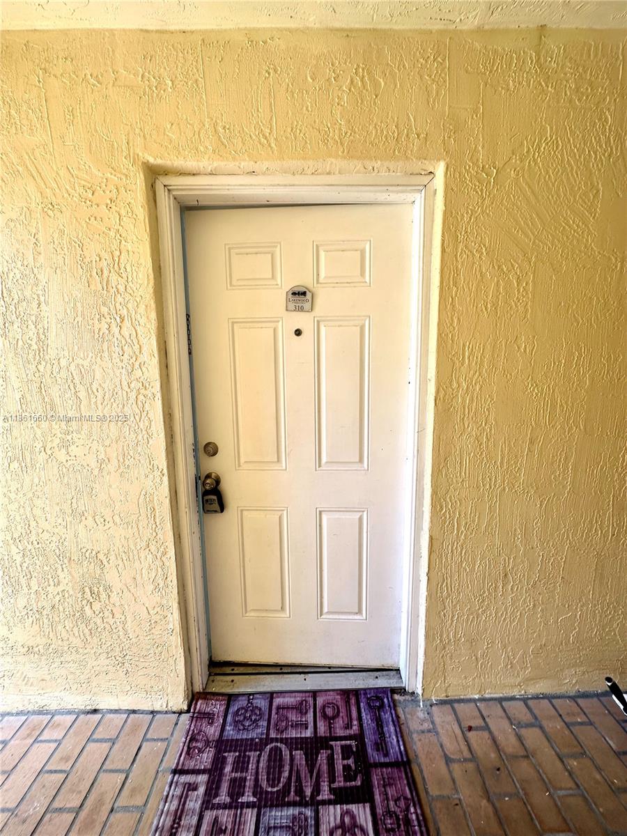 Playland Hollywood, FL 33021 - Photo 2 of 18 a view of a room with wooden floor and a window