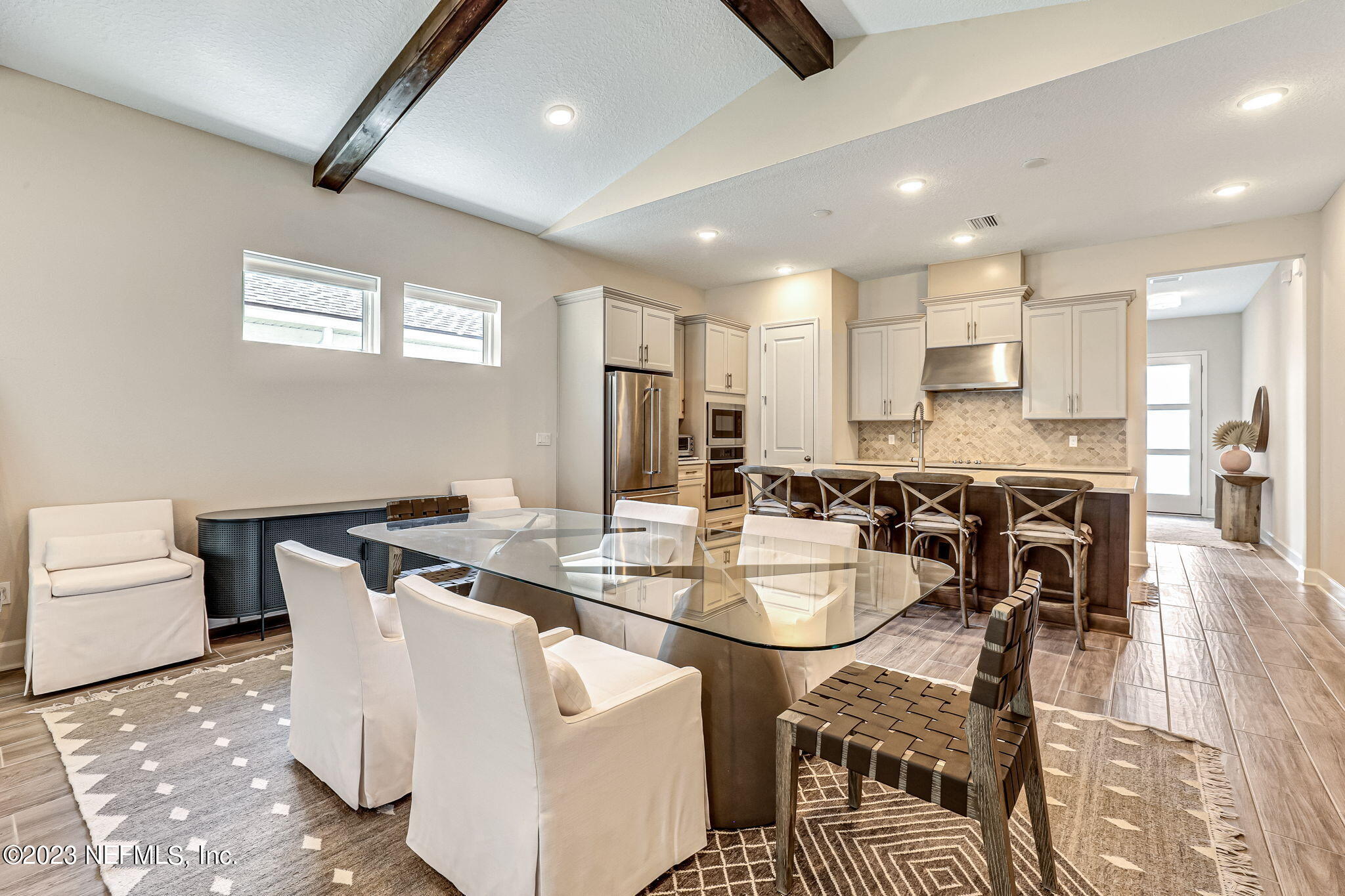 9863 Invention Lane Jacksonville, FL 32256 - Photo 15 of 56 a view of a dining room with furniture