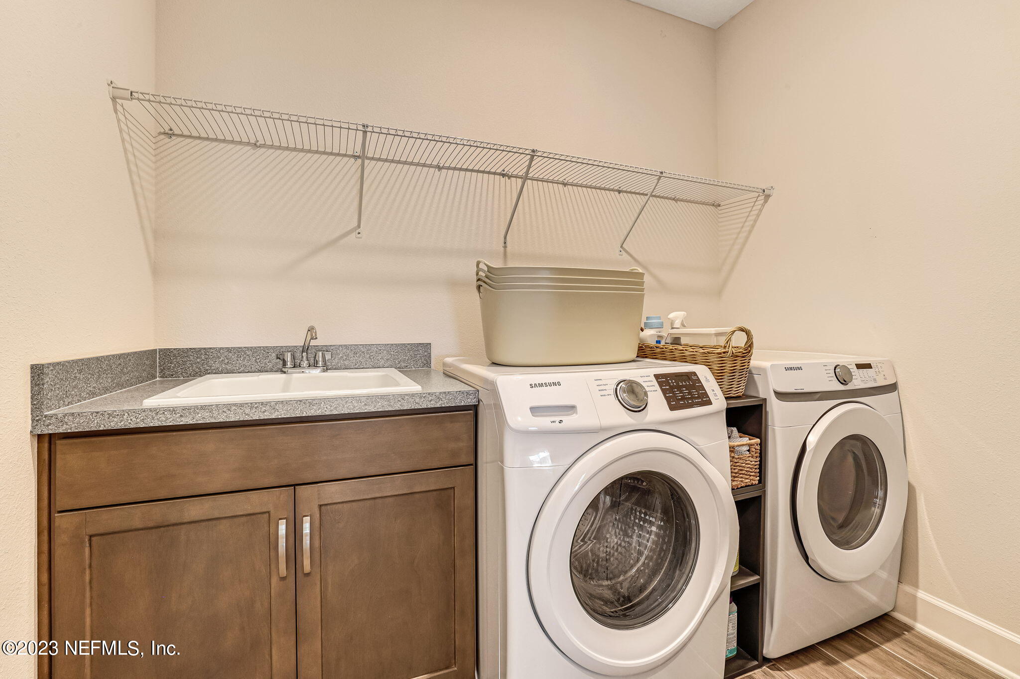 9863 Invention Lane Jacksonville, FL 32256 - Photo 28 of 56 a utility room with dryer and washer