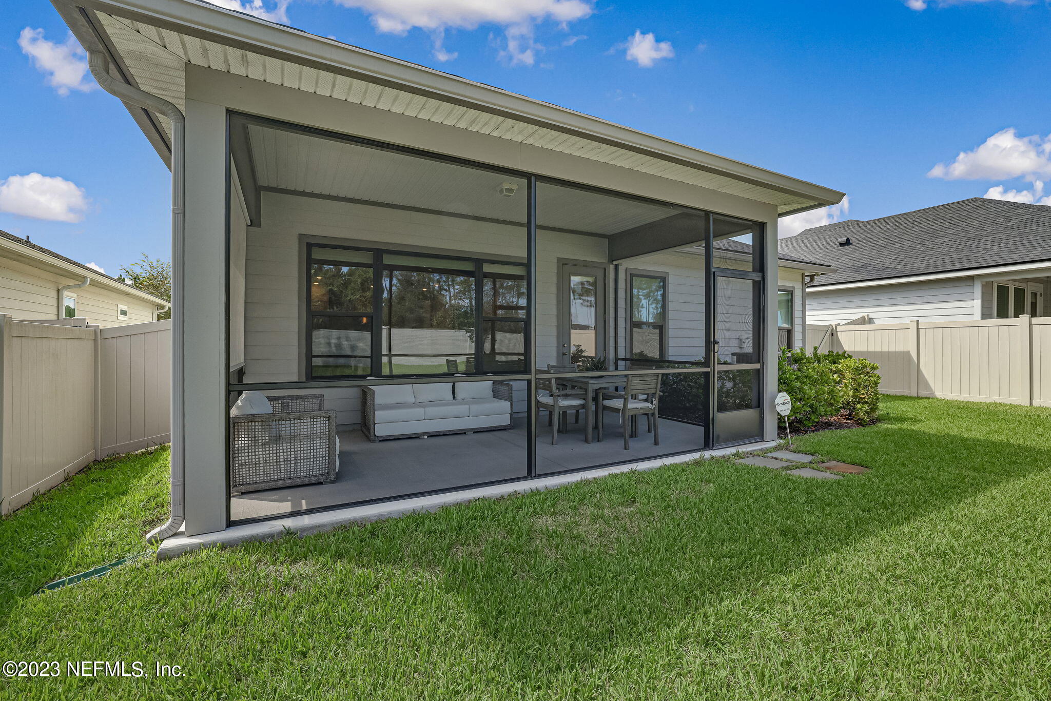 9863 Invention Lane Jacksonville, FL 32256 - Photo 46 of 56 a view of a house with a backyard