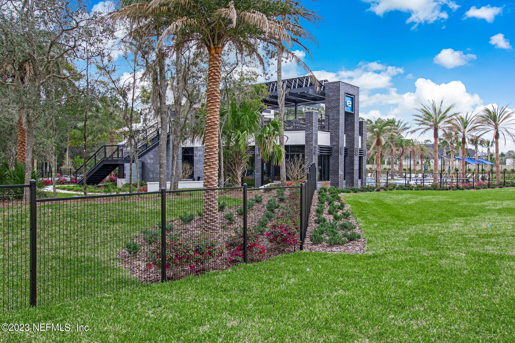 9863 Invention Lane Jacksonville, FL 32256 - Photo 50 of 56 a view of a house with a backyard