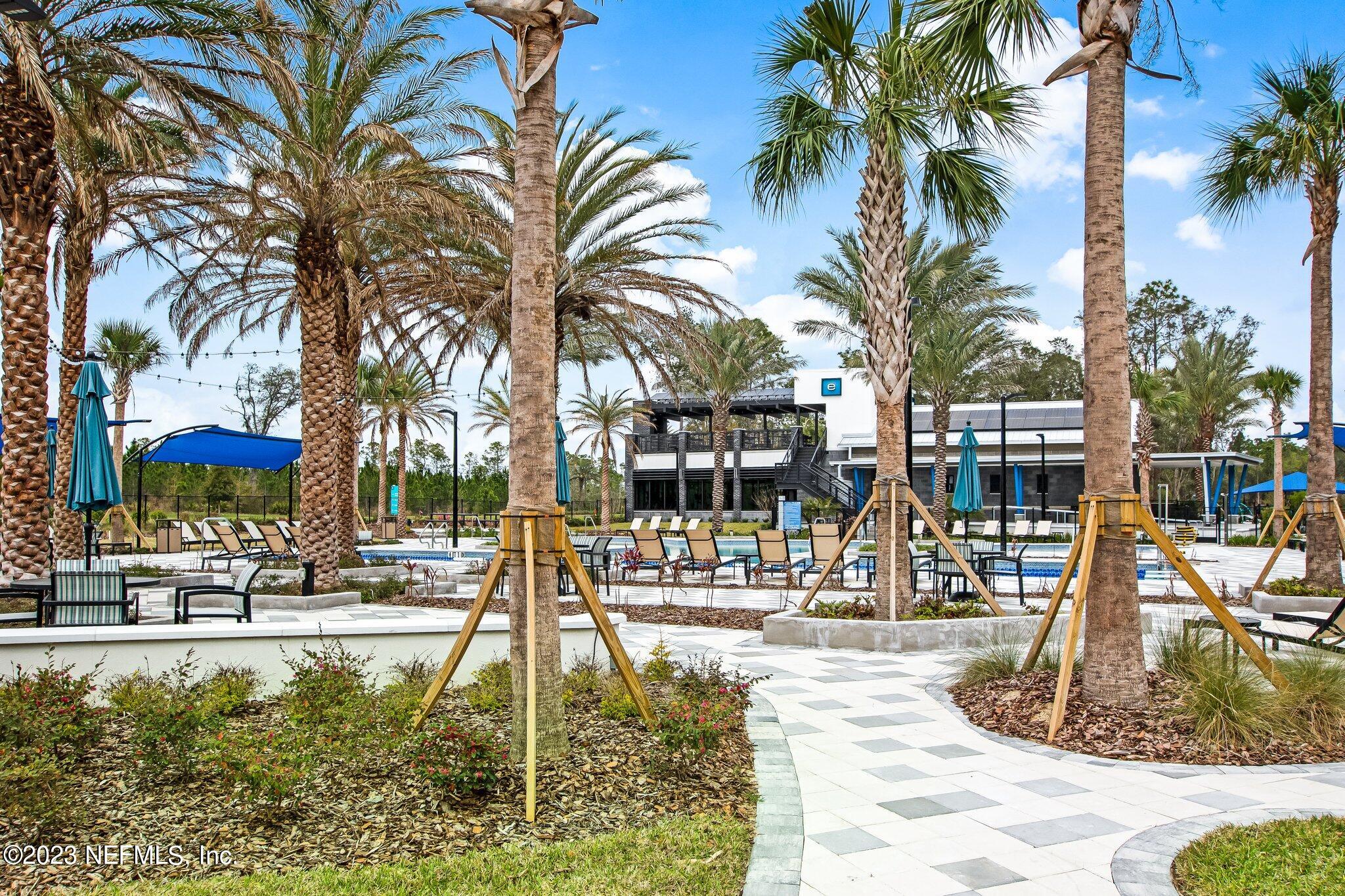 9863 Invention Lane Jacksonville, FL 32256 - Photo 53 of 56 a view of a swimming pool with a fountain