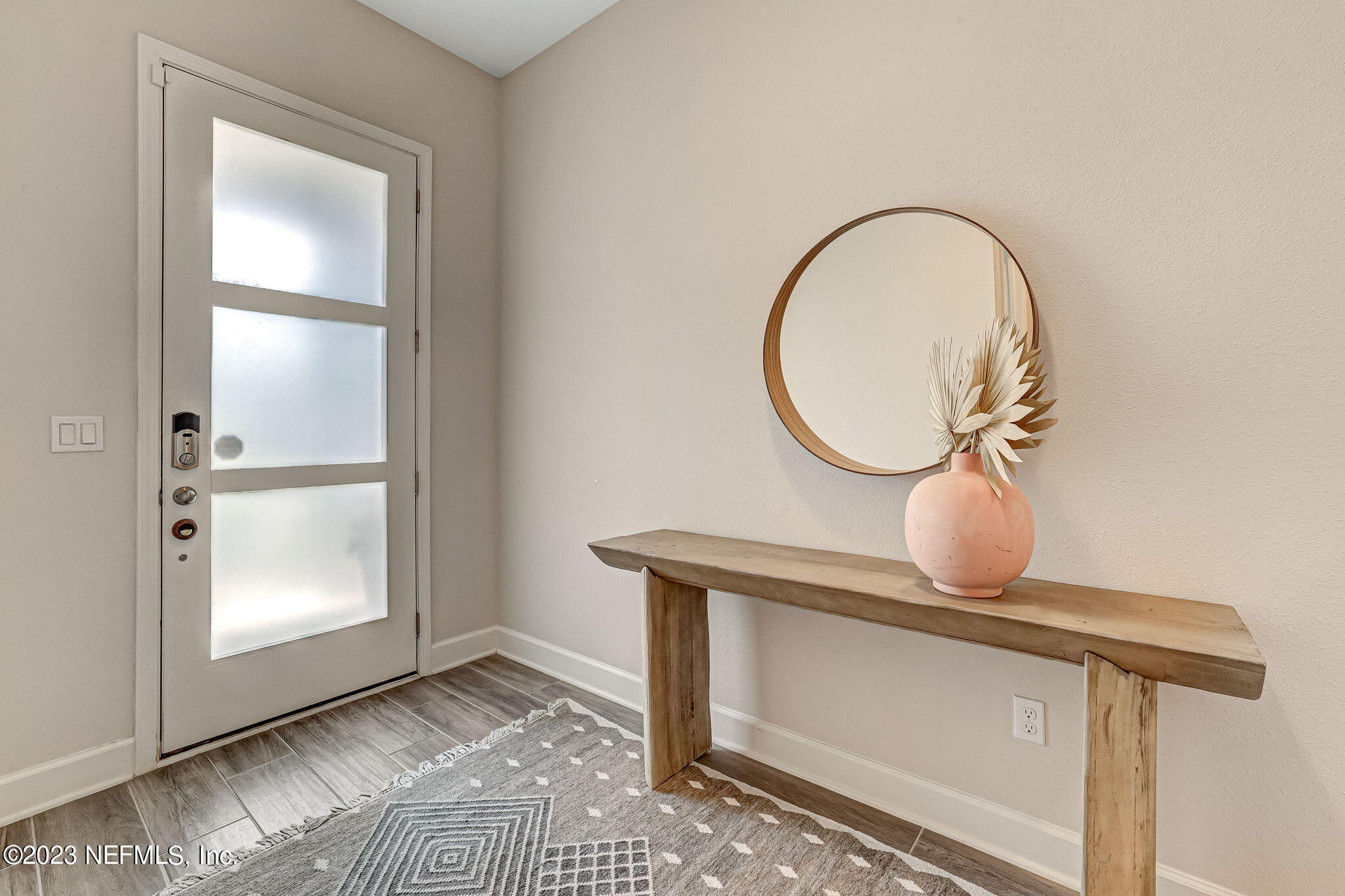 9863 Invention Lane Jacksonville, FL 32256 - Photo 8 of 56 a view of an entryway with sitting space